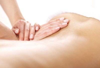 Patient receiving back massage